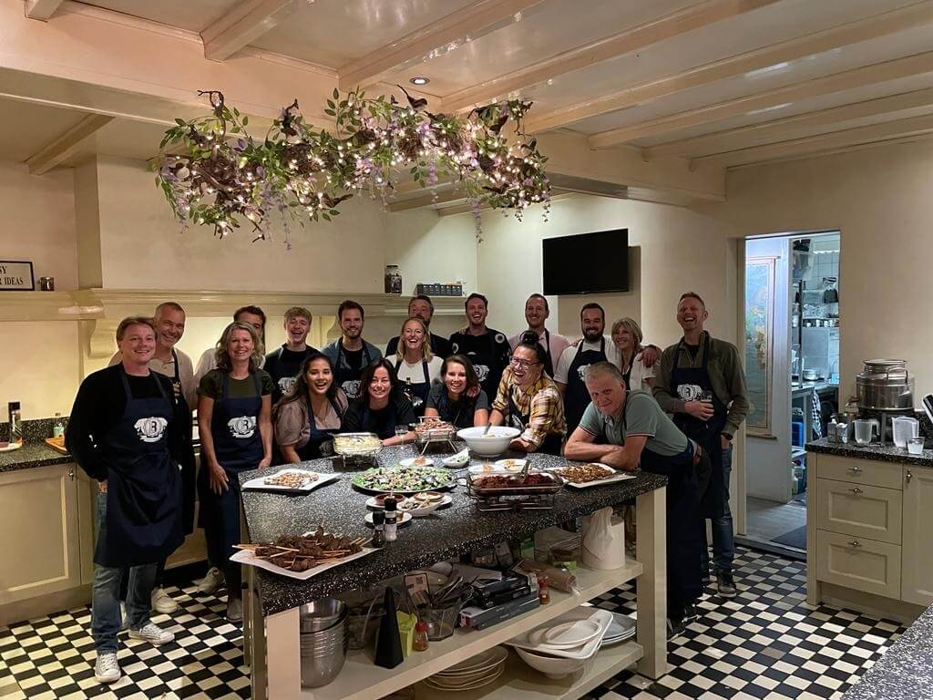 The Bricklog team gathers in the kitchen for a group picture